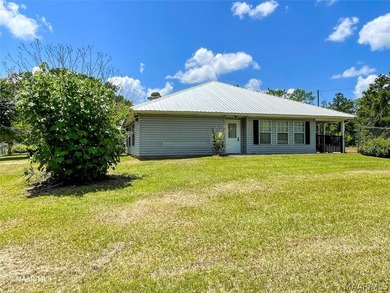 GREAT price on this versatile property...Metal Roof is only 2