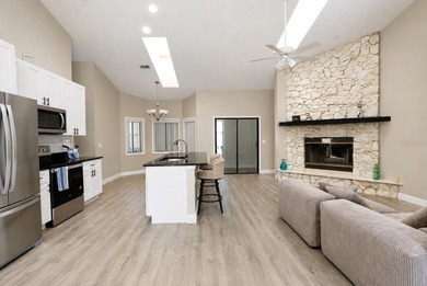 Beautifully renovated and move-in ready, this spacious 3-bedroom - photo 3