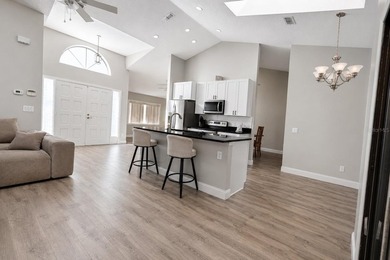 Beautifully renovated and move-in ready, this spacious 3-bedroom - photo 4