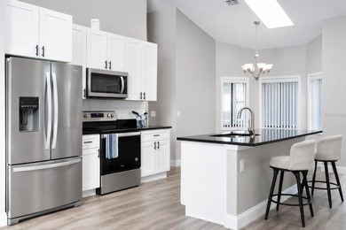 Beautifully renovated and move-in ready, this spacious 3-bedroom - photo 6