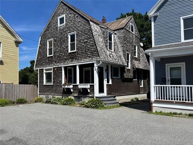 A true diamond in the rough, this classic Newport Dutch Colonial - photo 1