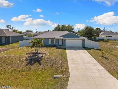 Step into this bright 3BR/2BA Cape Coral home in a sought-after - photo 1