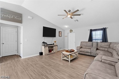Step into this bright 3BR/2BA Cape Coral home in a sought-after - photo 4