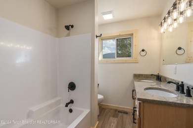 Experience maintenance-free living in this beautifully remodeled - photo 24