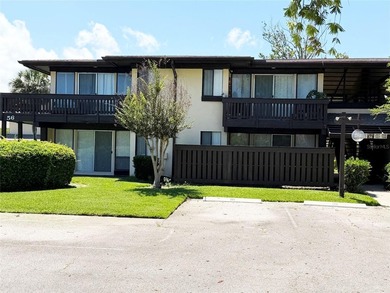 2 bedroom/2 bathroom end unit on ground floor with views of the - photo 1