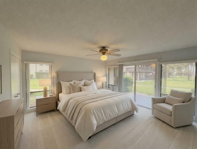 2 bedroom/2 bathroom end unit on ground floor with views of the - photo 3