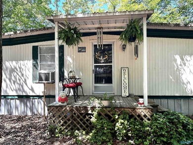 Enjoy lakeside living in this charming 3-bed / 1.5-bath mfg home - photo 2