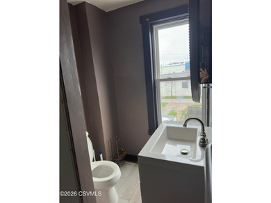 Opportunity awaits with this 3-bedroom, 2 bath half double - photo 12