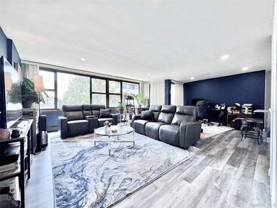Move right in! This bright, spacious, renovated 5th-floor corner - photo 1