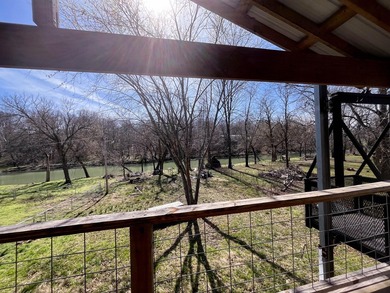 Discover the ultimate Ozark escape! This stunning 3-bedroom - photo 3
