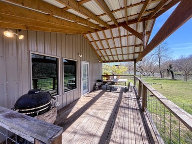 Discover the ultimate Ozark escape! This stunning 3-bedroom - photo 5