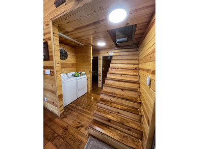 Discover the ultimate Ozark escape! This stunning 3-bedroom - photo 8