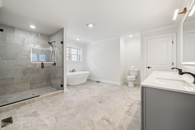 The epitome of a modern coastal New Construction waterfront home