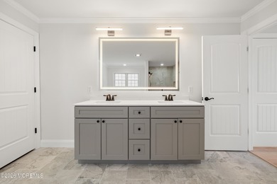 The epitome of a modern coastal New Construction waterfront home