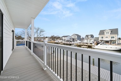 The epitome of a modern coastal New Construction waterfront home
