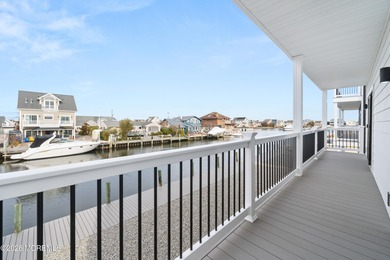 The epitome of a modern coastal New Construction waterfront home