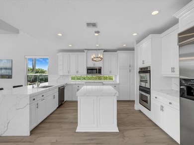 Situated on a beautiful pie-shaped cul-de-sac lakefront lot in - photo 17