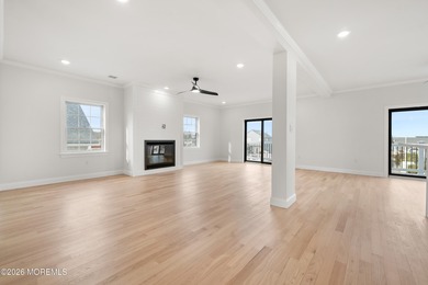 The epitome of a modern coastal New Construction waterfront home