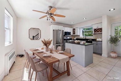 This versatile B3 two-family home has been thoughtfully - photo 4