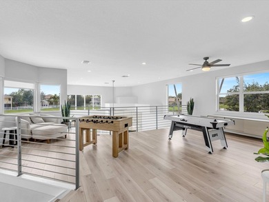 Situated on a beautiful pie-shaped cul-de-sac lakefront lot in - photo 49