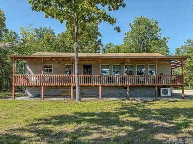 Tucked away in the beautiful Ozarks near Bull Shoals Lake, this - photo 3