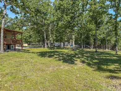 Tucked away in the beautiful Ozarks near Bull Shoals Lake, this - photo 7