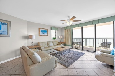 This beautifully maintained four-bedroom, end unit oceanfront