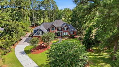 Welcome to this elegant Southern estate situated on a pristine - photo 10