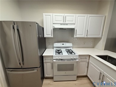 Welcome to this beautifully renovated first-floor condominium - photo 5