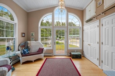 Beautiful arched-window entry welcomes you to this inviting lake - photo 7