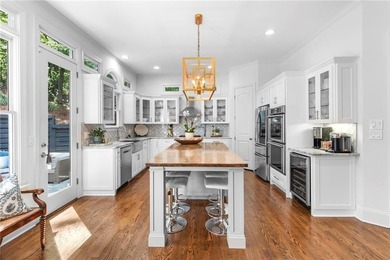 Beautifully remodeled four-sided brick & shingle home with three - photo 11
