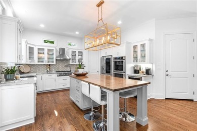 Beautifully remodeled four-sided brick & shingle home with three - photo 12