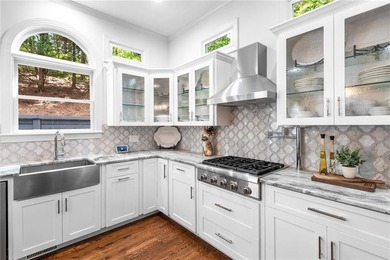 Beautifully remodeled four-sided brick & shingle home with three - photo 13