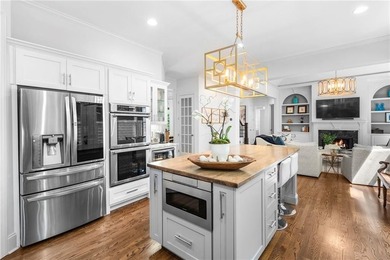 Beautifully remodeled four-sided brick & shingle home with three - photo 15