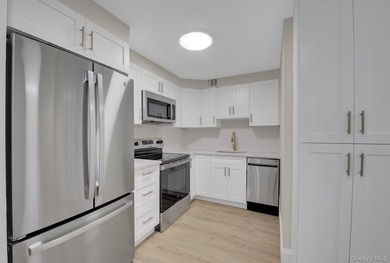 Move right into this updated 3-bedroom, Co-op in Le Havre in - photo 9
