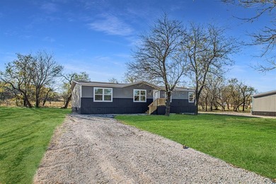 Lake Home For Sale in Runaway Bay, Texas