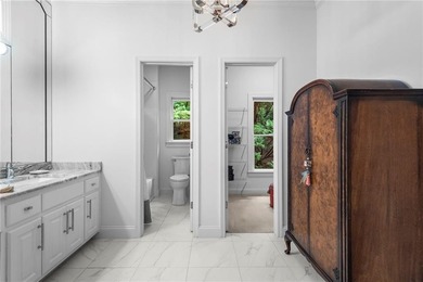 Beautifully remodeled four-sided brick & shingle home with three - photo 39