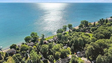 Wake up to water views every single day. This brick ranch sits - photo 31