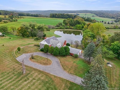 Discover a truly unique Millbrook estate set on over 6 acres - photo 2
