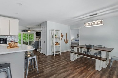Built in 2023, this lakefront condo at Green Turtle Bay Resort & - photo 5