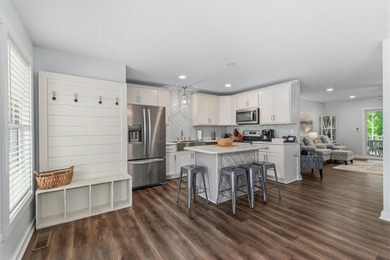 Built in 2023, this lakefront condo at Green Turtle Bay Resort & - photo 6