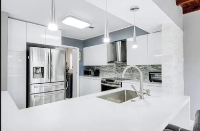 Step into this stunning, fully remodeled Hollywood Hills - photo 4