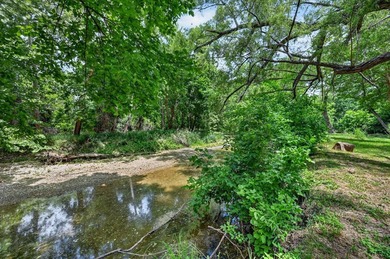 Hidden beneath a canopy of mature trees and tucked away close to - photo 38