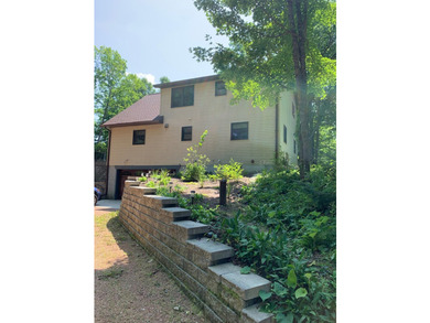 This 3 bedroom, 2 bath home is located in a parklike setting on - photo 1