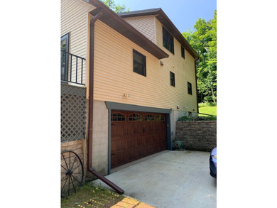 This 3 bedroom, 2 bath home is located in a parklike setting on - photo 2