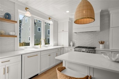 Beautifully transformed from top to bottom, this exceptional - photo 2