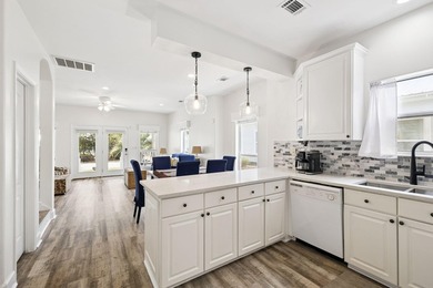 Experience the Emerald Coast in this updated, natural - photo 12
