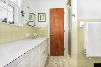 There's something special about a classic brick home on a quiet - photo 21