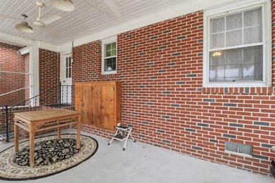 There's something special about a classic brick home on a quiet - photo 32