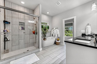 Tucked into the wooded hills of Bella Vista, this home delivers - photo 13